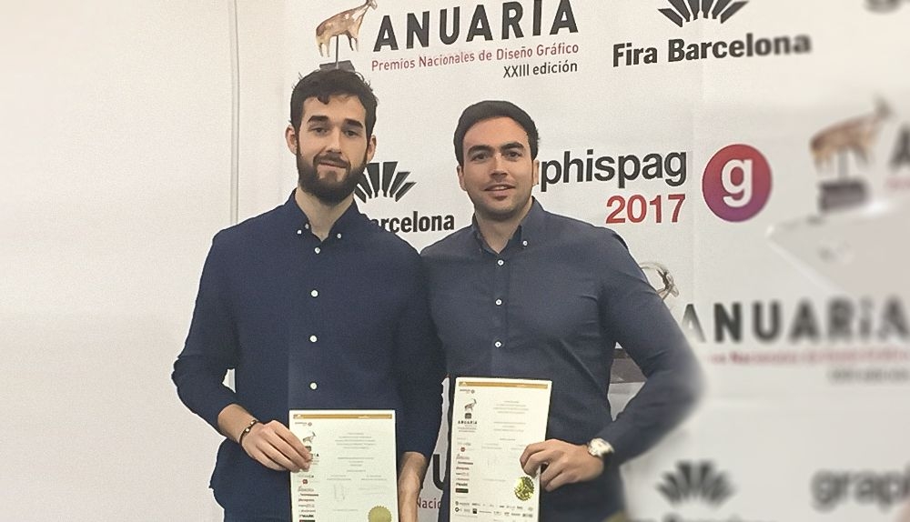 Alberto y Daniel con los premios